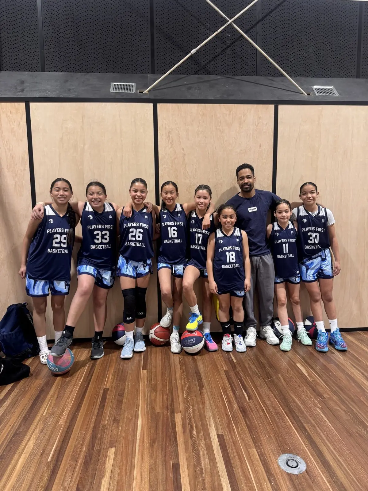 Players First girls tournament team with their coach