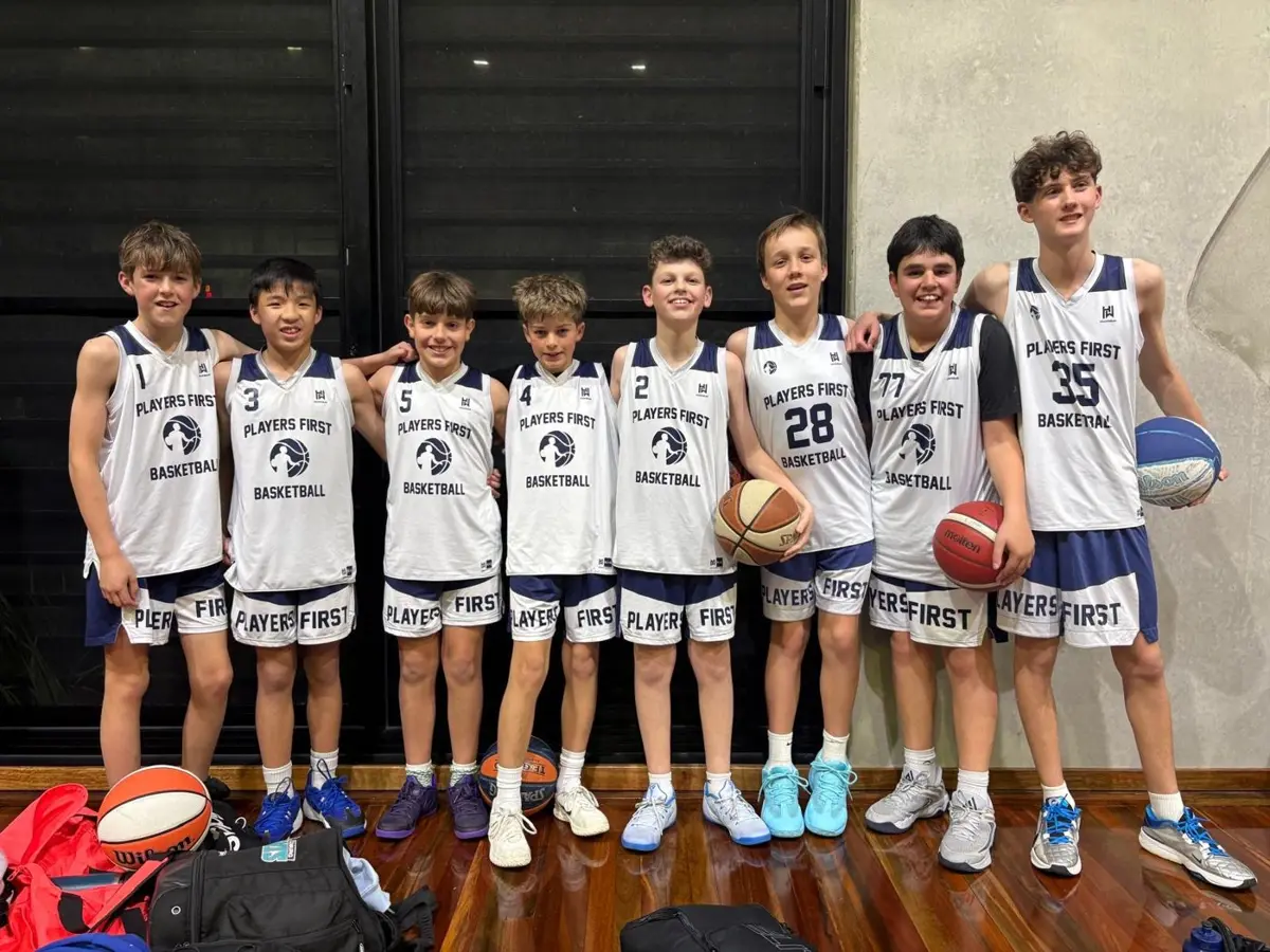 A Players First tournament team in their white Players First uniforms